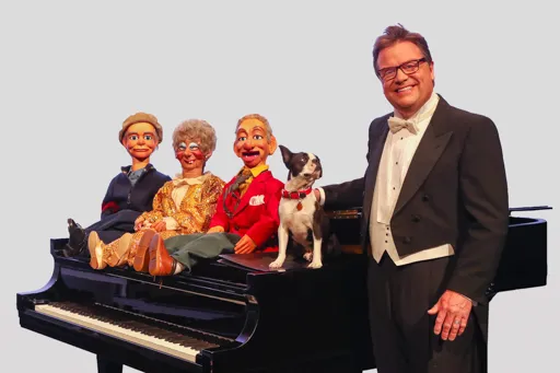 Todd Oliver and two of his ventriloquist dummys and his dog!